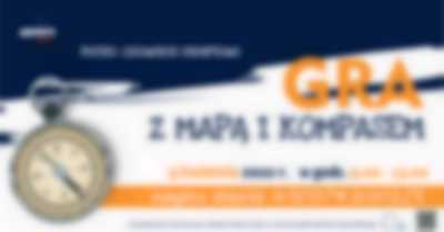 Gra z kompasem - baner informacyjny z obrazkiem kompasu
